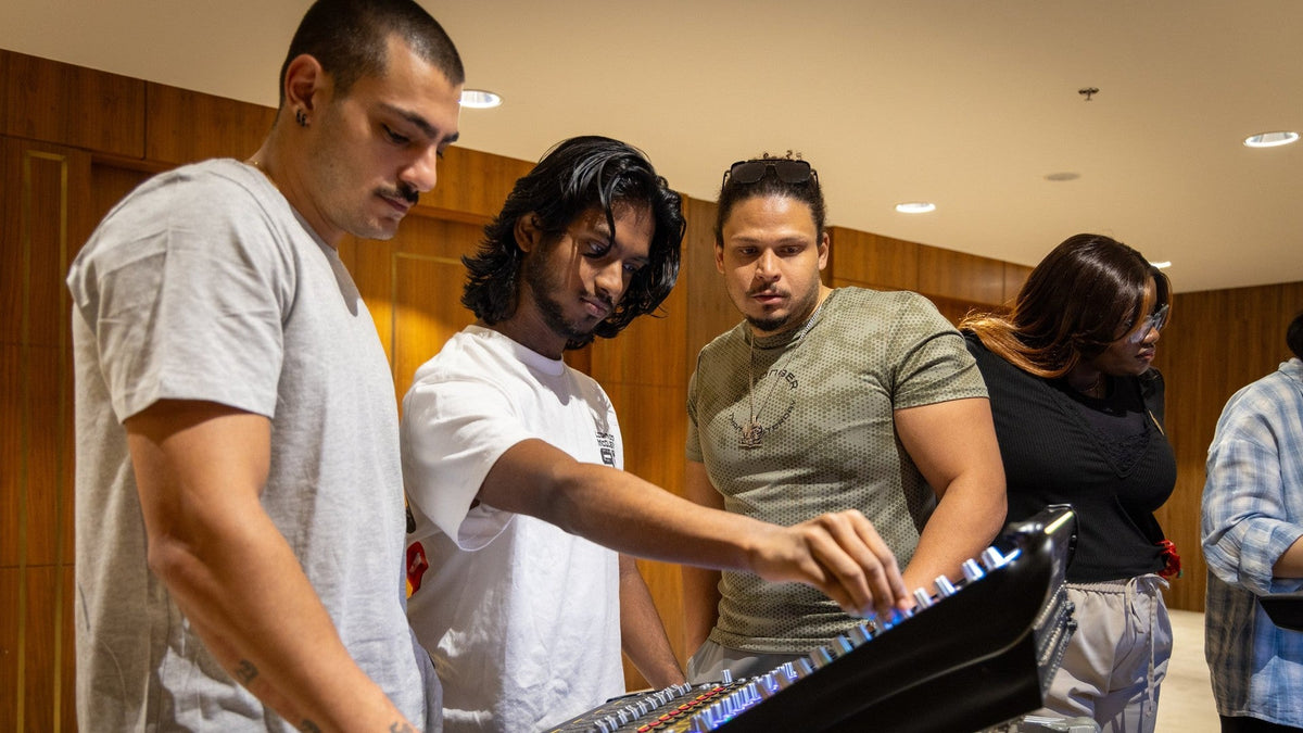 Students at University of the Arts Sharjah working on a DiGiCo Quantum 112 console